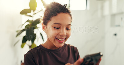 Buy stock photo Phone, happy and child in bathroom in home with social media, networking or communication. Smile, technology and girl kid with cellphone for contact or online scroll on mobile app in morning at house