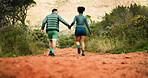 Back, holding hands and couple in forest, fitness and support with environment, explore and wellness. People, outdoor and man with woman, endurance and walking with training, adventure and challenge