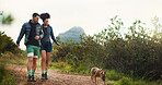 Couple, hiking and travel with dog on mountain for getaway, morning exercise and trekking adventure. People, fitness and walking with pet companion, tourism journey and fresh air for vacation bonding