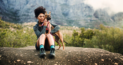 Buy stock photo Cuddle, hiking or relax with woman and dog in mountains for adventure, bonding or journey. Break, love or trekking with happy pet owner and puppy outdoor in forest together for exercise or fitness