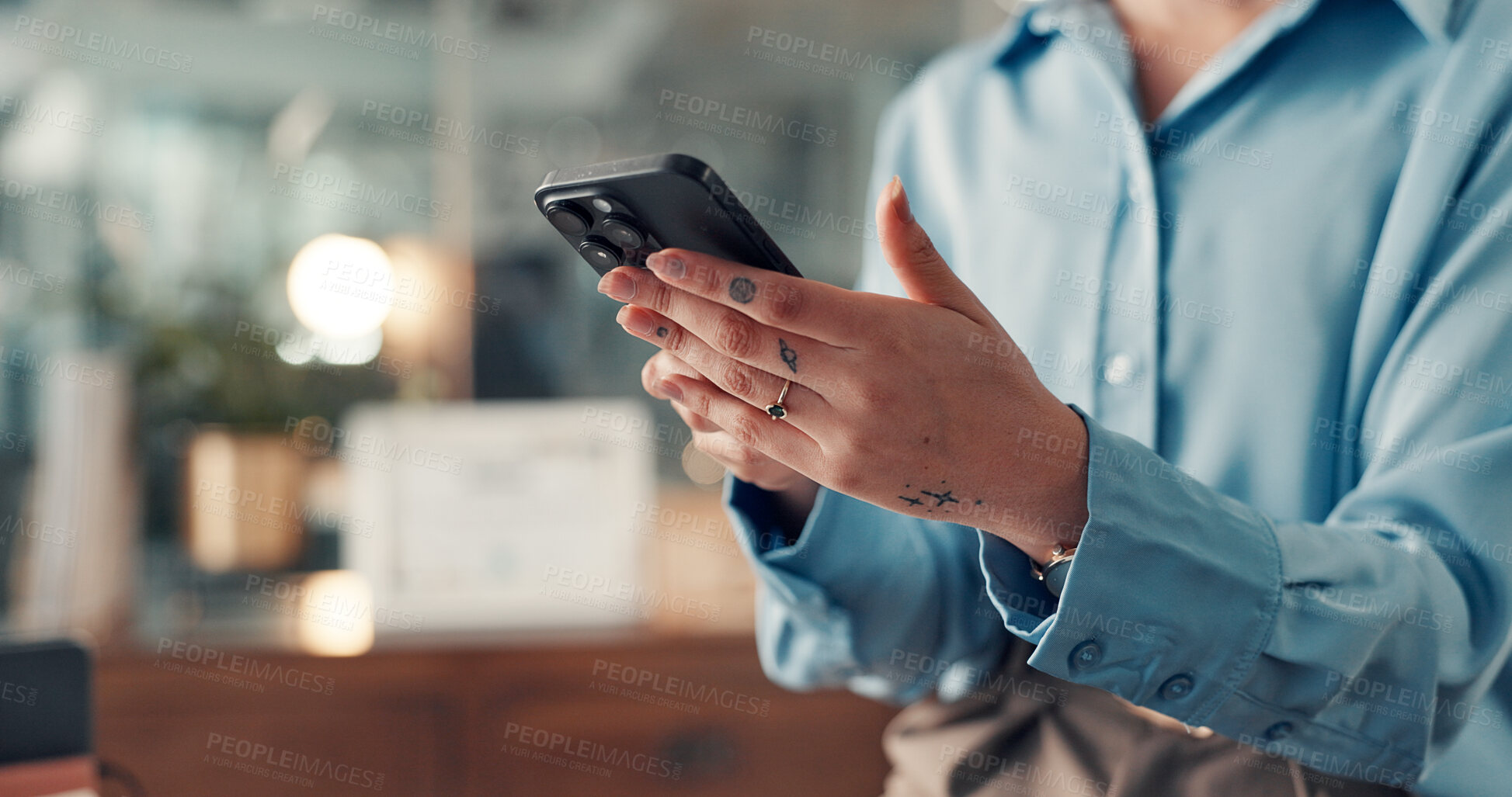 Buy stock photo Phone, hands and businesswoman in office with networking, communication or contact on mobile app. Research, technology and female creative director with chatting online with cellphone in workplace.