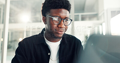Buy stock photo Happy, black man and research in office with tech, design and site mapping for creating software. Smile, person and web designer at workstation with flare, laptop and branding for creative project.