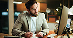 Writing, notes and businessman in office at night with research for finance report with deadline. Computer, reading and male financial manager with investment proposal for overtime in workplace.