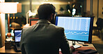 Businessman, back and night trading with computer screen for stock market analysis or research. Man, broker or trader working late with techology, graph or chart for monitoring exchange in workplace