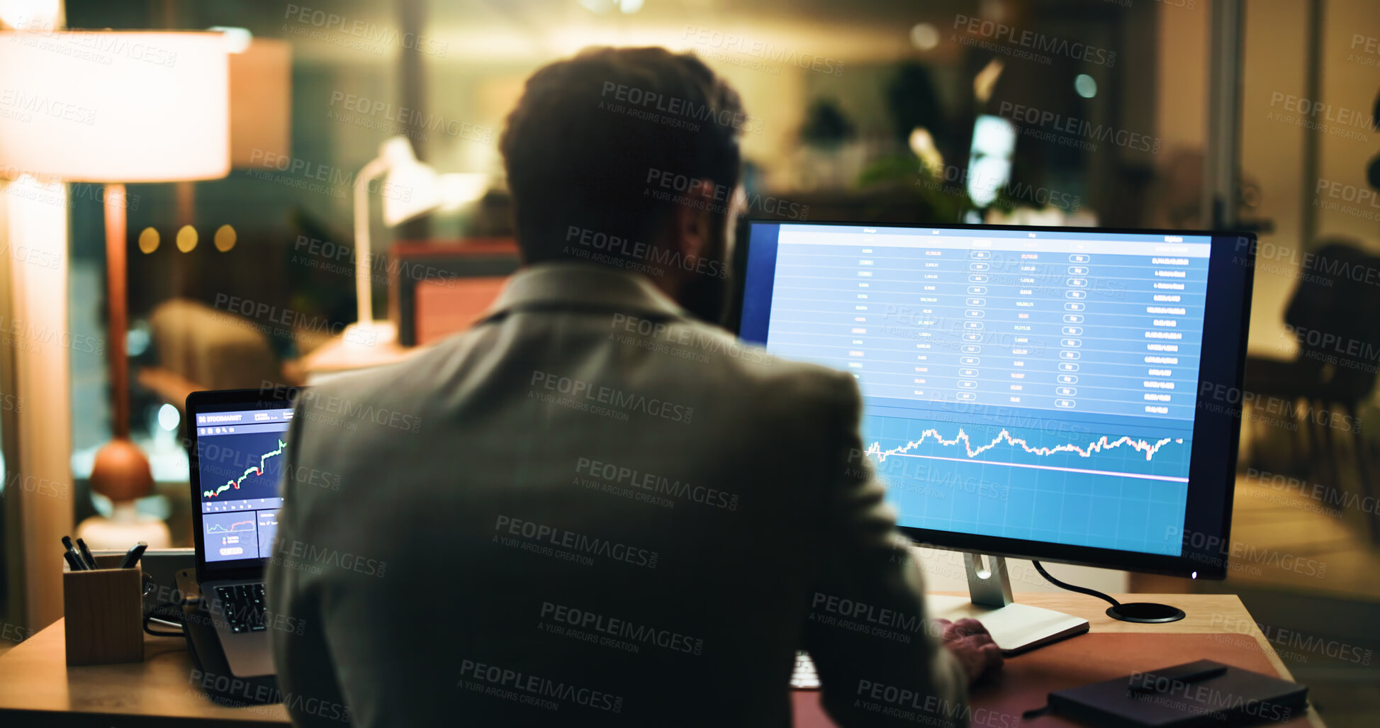 Buy stock photo Businessman, back and night trading with computer screen for stock market analysis or research. Man, broker or trader working late with technology, graph or chart for monitoring exchange in workplace