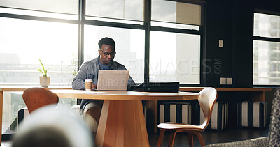 Buy stock photo Coffee shop, creative and black man on laptop for working on online report, article and research. Publishing, remote worker and person on computer for copywriting, editing news and website in cafe