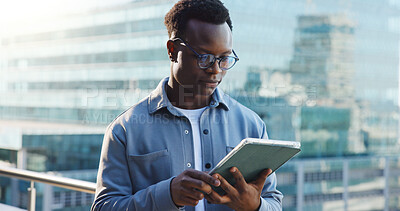 Buy stock photo Business man, tablet and reading in city with analysis, review or research for economic report. Black person, technology and male economist on balcony with digital study or survey for fiscal policy