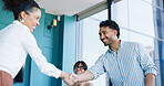 Happy, business people and meeting with handshake for introduction, interview or hiring in office. Businessman, woman or team shaking hands with smile for recruitment or onboarding in workplace