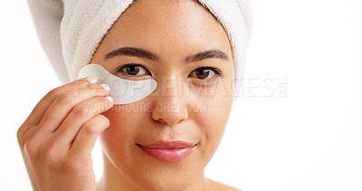 Buy stock photo Skincare, eye patches and portrait of woman happy for glow, gel or dark circles. Space, towel and natural beauty of person with facial care, hydration mask or dermatology on white studio background