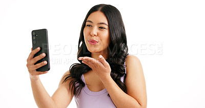 Buy stock photo Woman, hair care and blow kiss for selfie in studio, salon review and social media engagement. Girl, smile and photography on white background space with hairstyle, beauty blog update or love gesture