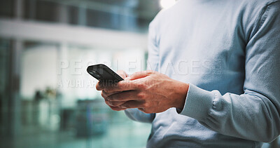 Buy stock photo Text, hands and person in office with phone, email feedback or communication in finance company. Typing, business and man in workplace with technology, document download or checking meeting schedule.