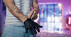 Hands, tattoo and artist in studio with glove, hygiene or safety preparation for appointment. Body art, PPE or creative person in parlor with space, sterilization or aftercare in small business
