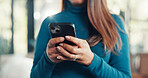 Phone, hands and woman in home with networking, communication or chatting on mobile app. Technology, typing and female person with cellphone for email, texting and social media online in apartment.