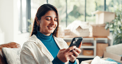 Buy stock photo Moving, boxes and woman with smartphone, lounge and browsing home renovation ideas on web or online. Happy, person and search with tech for interior design, remodeling and inspiration on social media