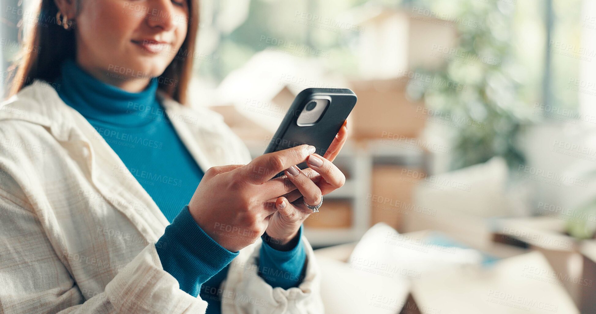 Buy stock photo Moving, online and woman with smartphone, lounge or browsing home renovation ideas on web and space. Scroll, search and person with tech for interior design, remodeling or inspiration on social media