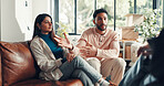 Couple, living room and argument with moving, realtor and stress in home or apartment. Real estate agent, woman and man with mortgage dispute, angry and drama with relocation anxiety with partner