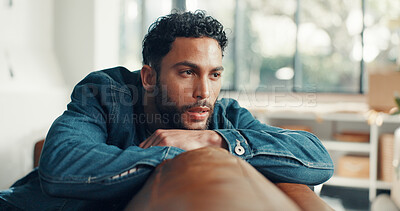 Buy stock photo Thinking, serious and man on sofa in home, daydreaming or remember memory. Reflection, deep thoughts and male person in living room for vision, pensive or future decision with idea on couch for relax
