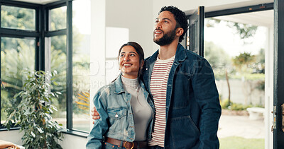 Buy stock photo Couple, thinking and happy in new home, hug and smile for real estate, loan and investment property. Reflection, man and woman in dream house, embrace and people with commitment of moving in together