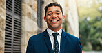 Portrait, smile and business man in city as real estate lawyer, about us and opportunity. Professional, happy employee and confident legal advisor, property attorney and pride outdoor in Spain