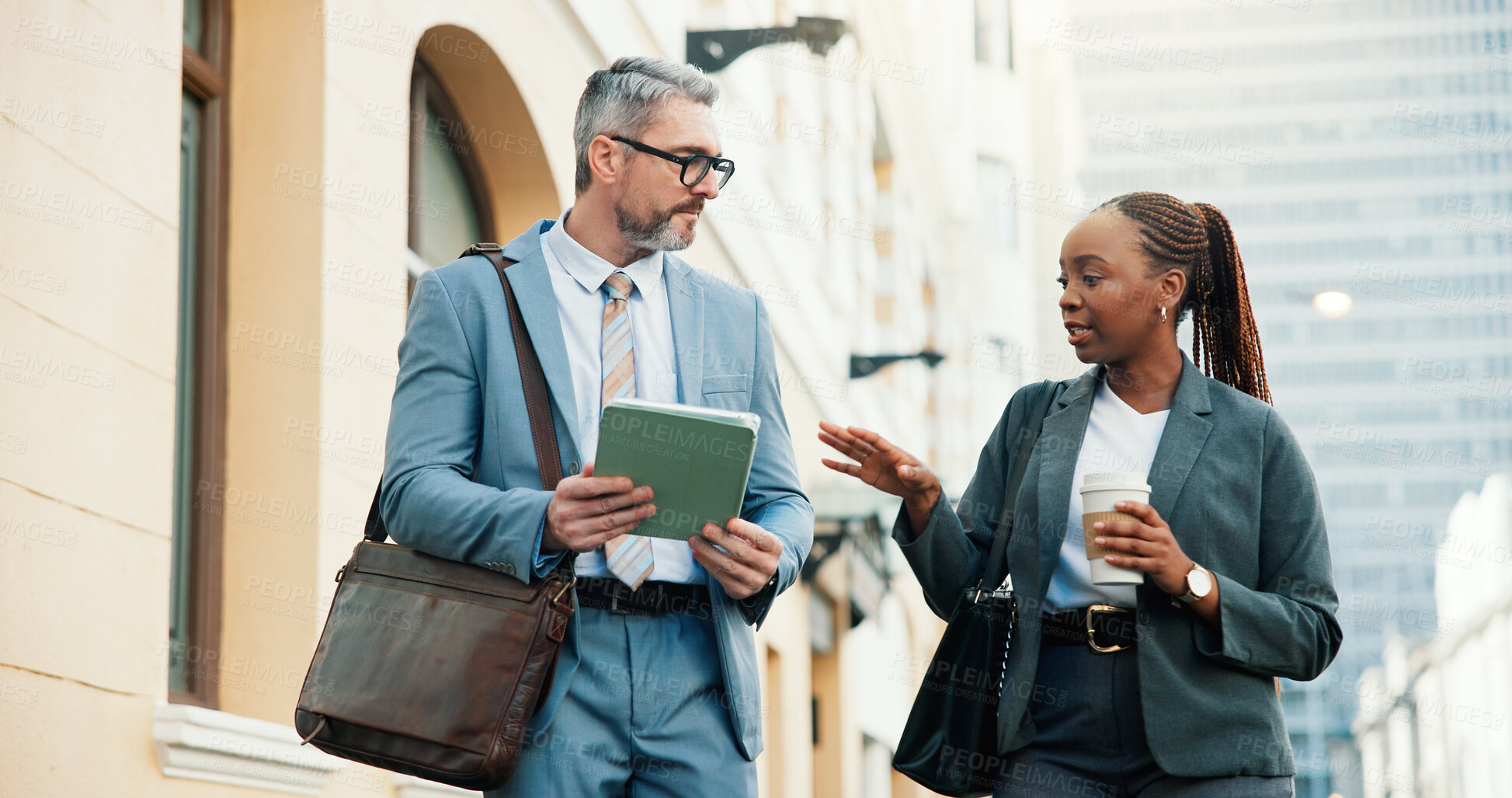 Buy stock photo Lawyers, people and tablet in city with walking, court prep for litigation or legislation discussion. Review case notes, team or mature man and woman with evidence, tech and ready for legal hearing