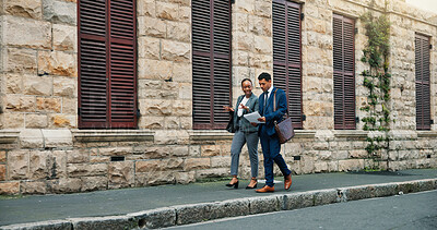 Buy stock photo Lawyer, team or walking on street with paperwork for client lawsuit, discussion or settlement document. Court case, man or woman with partnership for contract, legal system or justice for labor trial