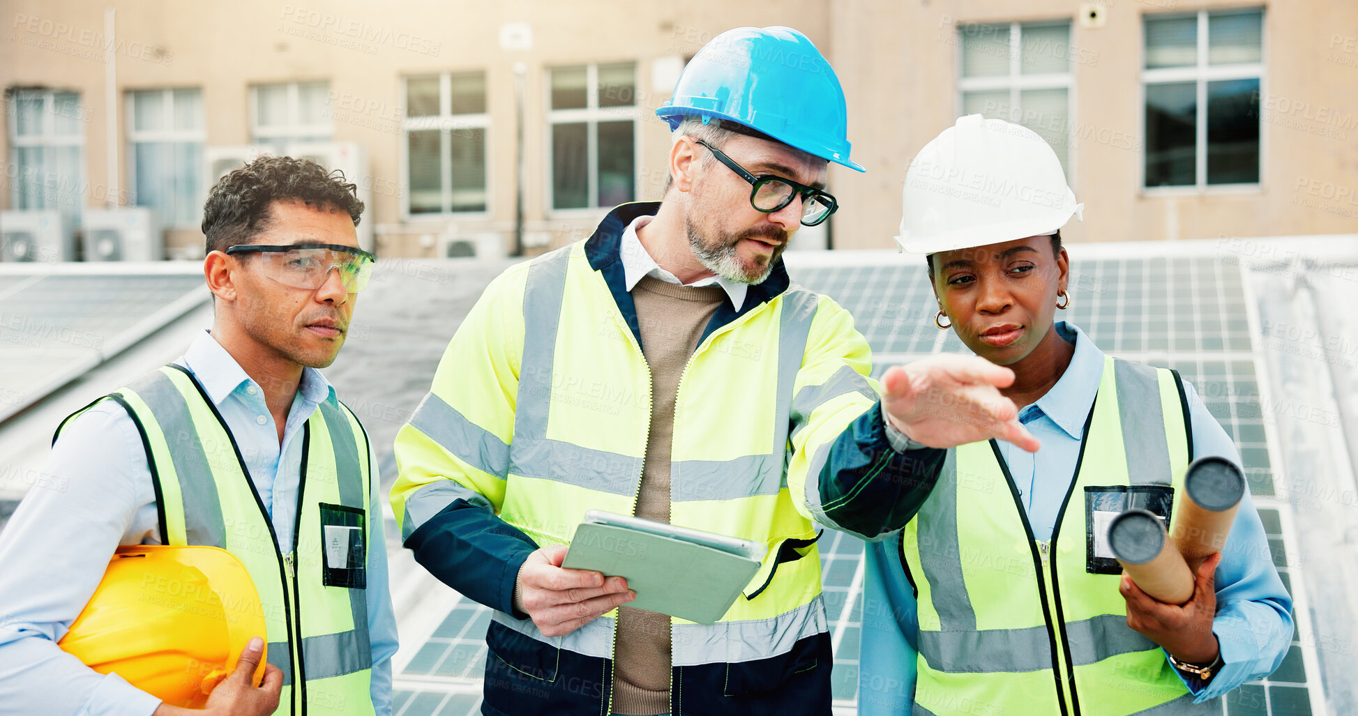 Buy stock photo People, engineer or team with tablet for solar power maintenance, development or project in city. Group, employees or technician with technology for sustainable plan or renewable energy on rooftop