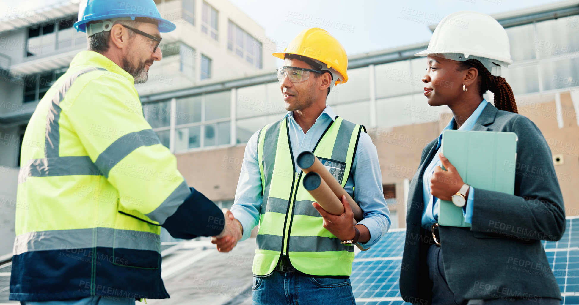 Buy stock photo Solar panel, technician or handshake with blueprint outdoor for PV design, installation or welcome. Photovoltaic team, people or shaking hands with tech on rooftop for renewable energy or maintenance