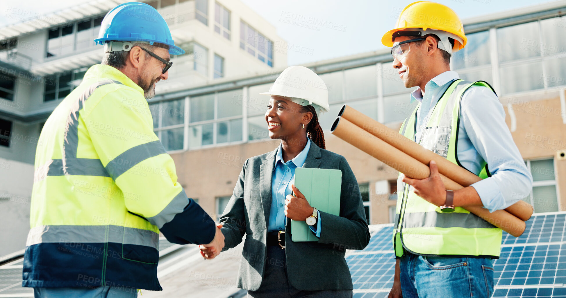 Buy stock photo Happy people, engineer and handshake with team for solar power project, maintenance or deal in city. Group, technician or employees shaking hands with smile for sustainable plan or renewable energy