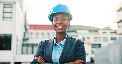 Buy stock photo Portrait, architecture and black woman in city, arms crossed and project management with career ambition. Outdoor, engineering and African person with helmet, pride and renovation with real estate