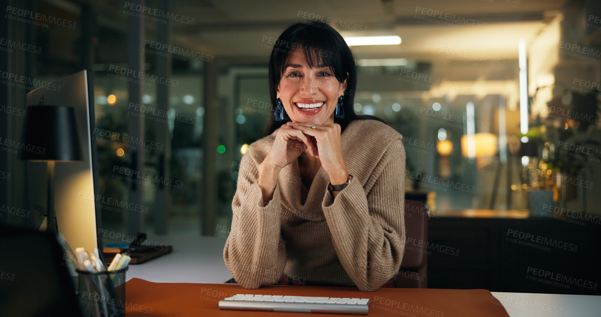 Buy stock photo Woman, smile and portrait at night in office for overtime, deadline and career at media company. Person, journalist and happy with confidence, writing or editing job in dark at agency in Portugal