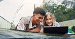 Smile, couple and relax in tent with laptop for research, watching movies and bonding together. Happy, people and rest with pc on camping getaway, browsing internet and online entertainment in nature