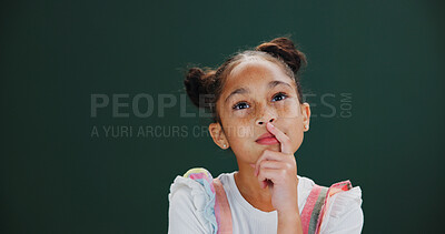 Buy stock photo Planning, ideas and child in studio with solution, choice or decision by mockup space with memory. Dreaming, problem solving and girl kid with brainstorming or thinking expression by green background