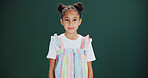 Portrait, student and girl in studio with smile, education and learning on green background. Happiness, creative or young female child in academy with mockup, space or growth for fashion in childhood