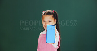 Buy stock photo Portrait, mockup screen and girl in studio, smartphone and announcement on green background. Space, child and cellphone with social media, internet and email with prize giveaway and connection
