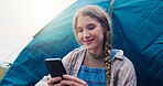 Tent, smartphone and woman with nature, internet and typing with social media, app and holiday. Outdoor, traveller or happy person with cellphone, communication and camping with online post in Sweden