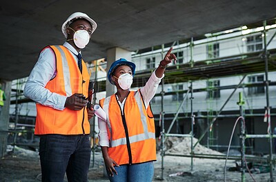 Buy stock photo People, meeting and team conversation at construction site, property development and project inclusion. Employees, engineering and pointing to infrastructure, safety gear and outdoor for inspection