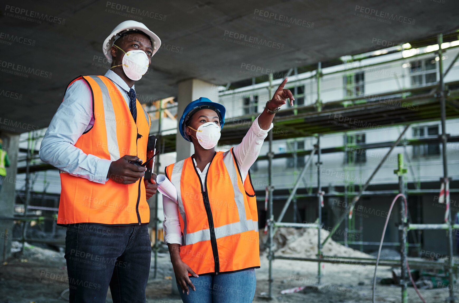 Buy stock photo People, meeting and team conversation at construction site, property development and project inclusion. Employees, engineering and pointing to infrastructure, safety gear and outdoor for inspection