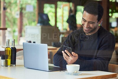 Buy stock photo Man, laptop and phone in coffee shop for remote work with laugh, meme and happy on break with social media. Writer, computer and reading smartphone for contact, chat or freelance copywriting in cafe