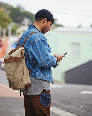 Buy stock photo Phone, man and city with phone and travel with urban navigation and social media with backpack. Street, online and text on a mobile with a traveler on journey with app search for road in town