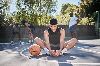 Buy stock photo Basketball, man and meditation with yoga, zen and calm mindset before training, exercise or game outdoor. Fitness, workout and wellness young gen z basketball player spiritual and meditate on court