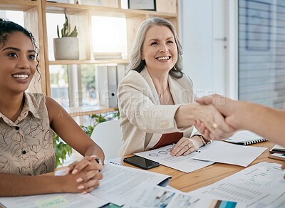 Buy stock photo Meeting, handshake and collaboration with a business woman in the office for a deal or agreement. Teamwork, collaboration and thank you with a senior female employee shaking hands with a colleague