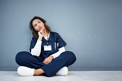 Buy stock photo Nurse, sitting or thinking of hospital treatment, medicine innovation or surgery planning on mock up wall. Doctor, woman or healthcare worker and ideas, vision or decision for wellness life insurance