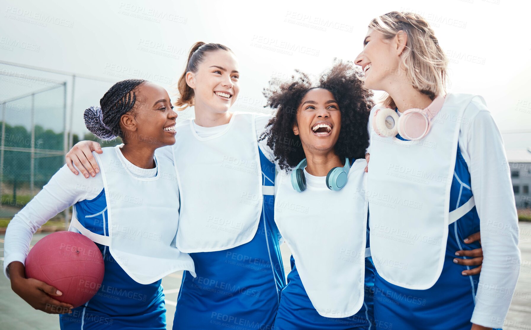 Buy stock photo Netball, team and friends laugh, women on outdoor court together and funny, sports and diversity. Happy athlete group, training for game and gen z with fitness and trust with support and humor