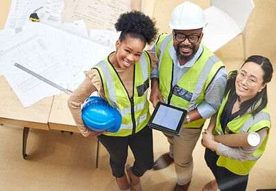 Buy stock photo Tablet, teamwork or portrait of engineers with designer planning a construction for architecture. Top view, blueprint or happy black people with Asian woman meeting together on a development project