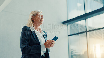 Buy stock photo Office, lobby and woman with phone for business trip, smile and online communication. Travel, mature person and accommodation review with mobile app for schedule, meeting booking and confidence