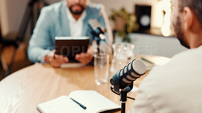 Buy stock photo Podcast, live stream and people in studio with mic for interview, conversation and broadcast for radio show. Content creation, media and presenter with person for recording, hosting and talking