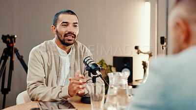 Buy stock photo Podcast, mic and people with guest in studio for interview, conversation and broadcast for radio show. Content creation, hosting and presenter with man for recording, live stream or talking for media