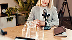 Podcast, speaker and businesswoman with microphone in studio with online subscribers with talk show. Happy, journalist and female radio host with live streaming, recording or broadcast in office.