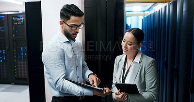 Buy stock photo Man, woman and clipboard in server room for discussion, team or checklist for IT solution at company. People, cybersecurity and point with review, maintenance or information technology at data center