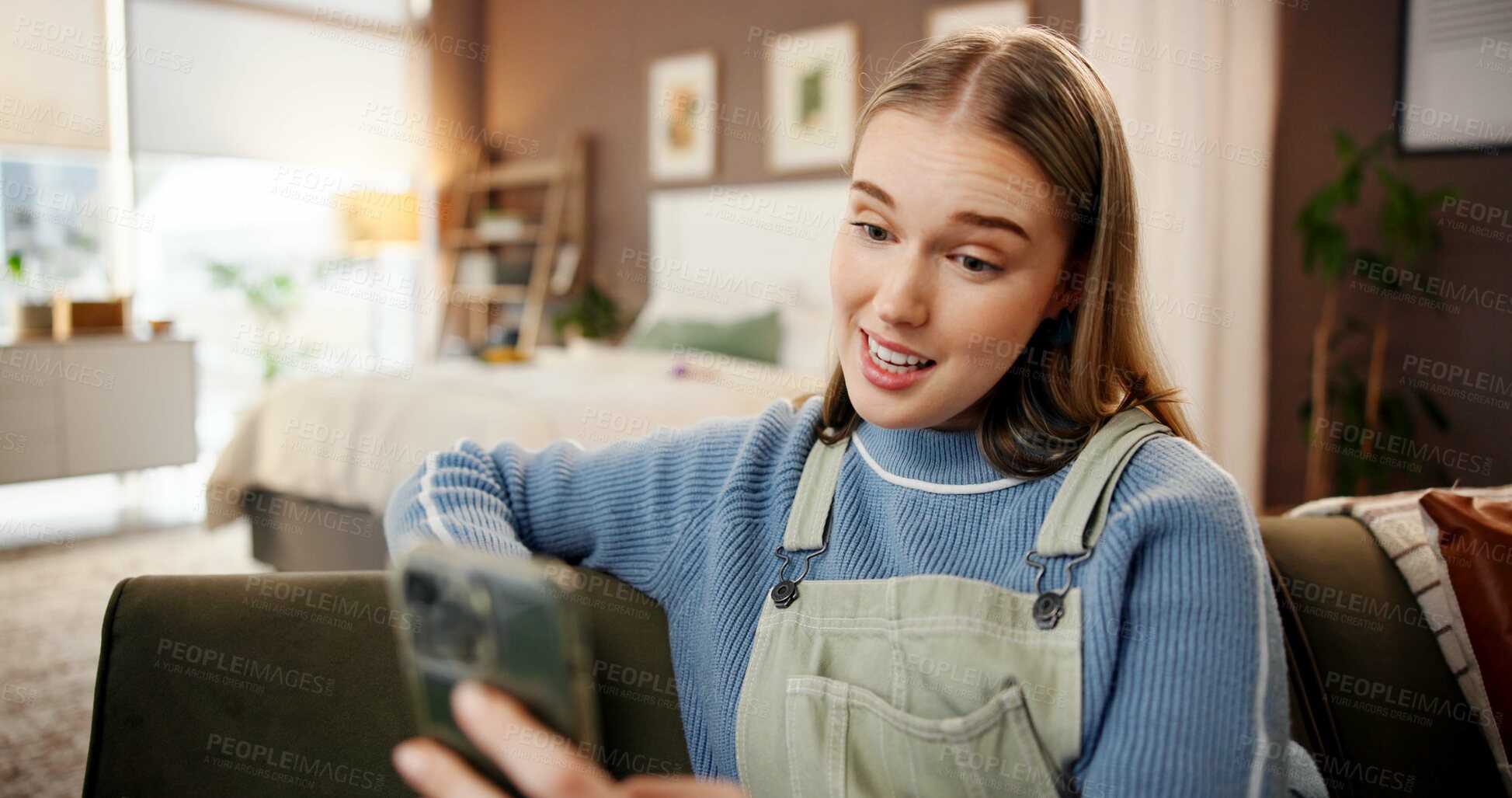 Buy stock photo Cellphone, video call and woman on sofa in home with communication, contact or networking online. Happy, talking and female person with virtual conversation on phone in living room at apartment.